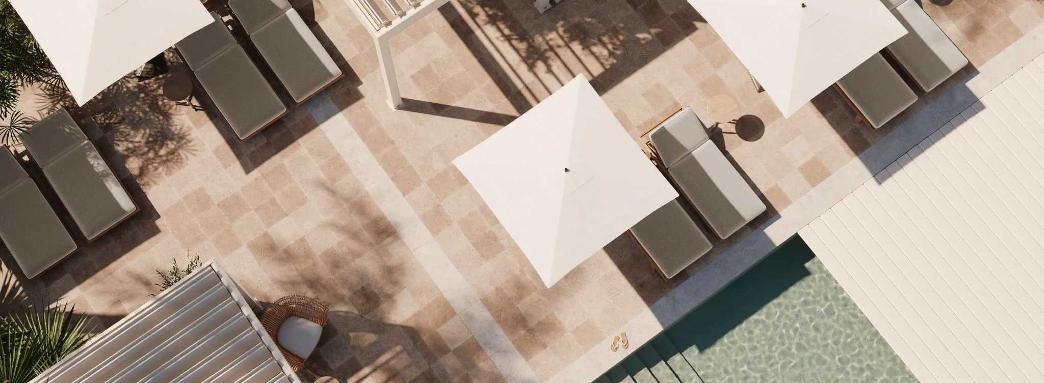 Parasols and pergolas on a terrace with a pool