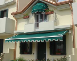 Awning eurosol 3020 green with flap on facade of private house